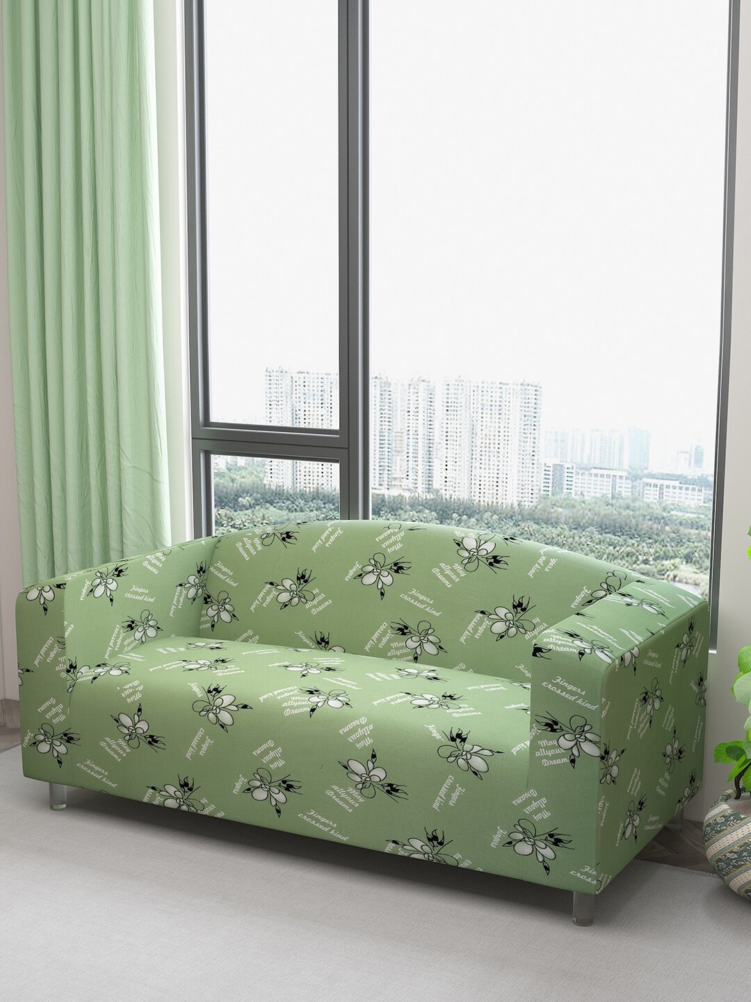 

DREAM CARE Green & White Printed Waterproof 3-Seater Sofa Cover With Anti Slip Foam Sticks