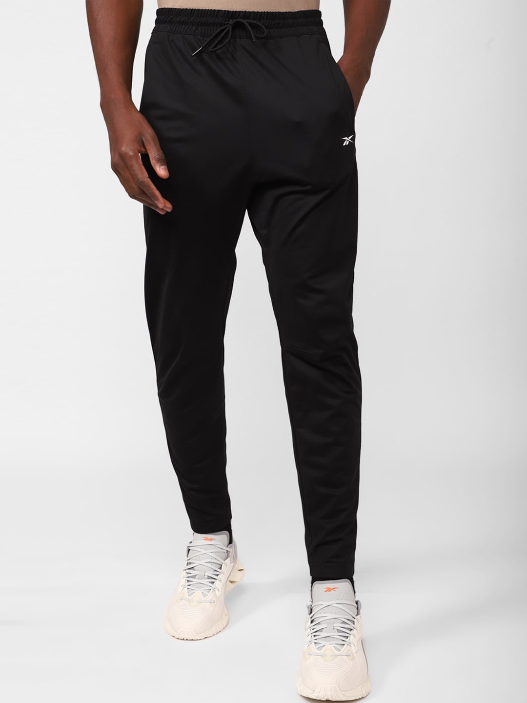 

Reebok Men WOR Knit Slim-Fit Track Pant, Black