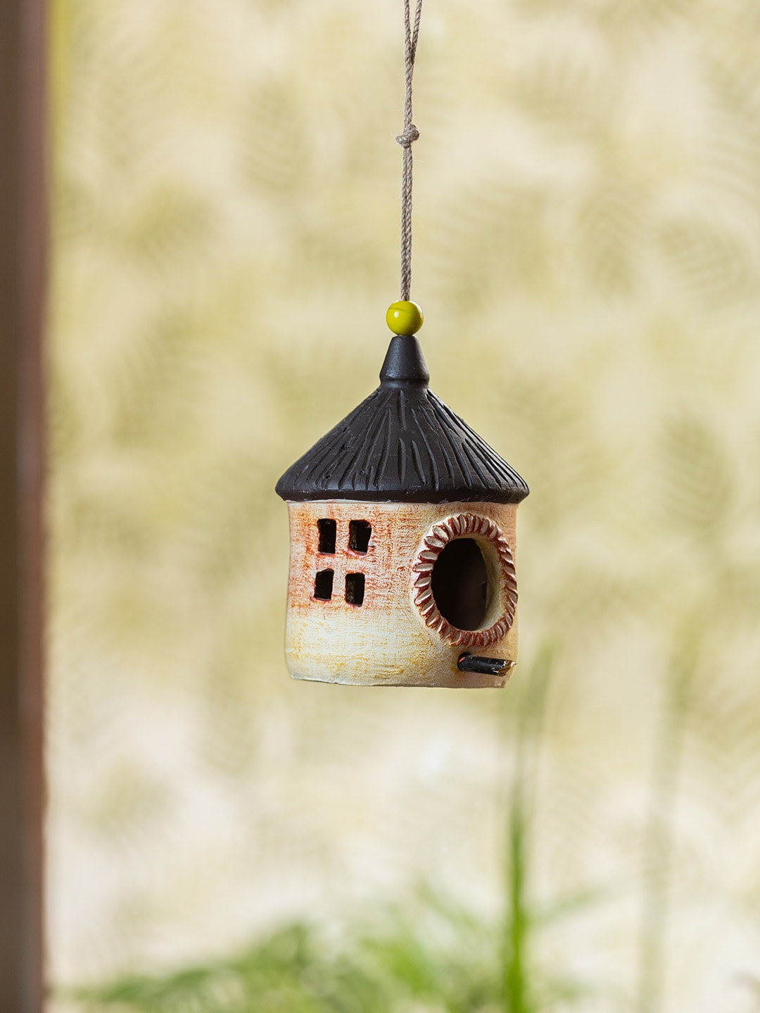 

ExclusiveLane Cream-Coloured Village Cottage Terracotta Hanging Bird House