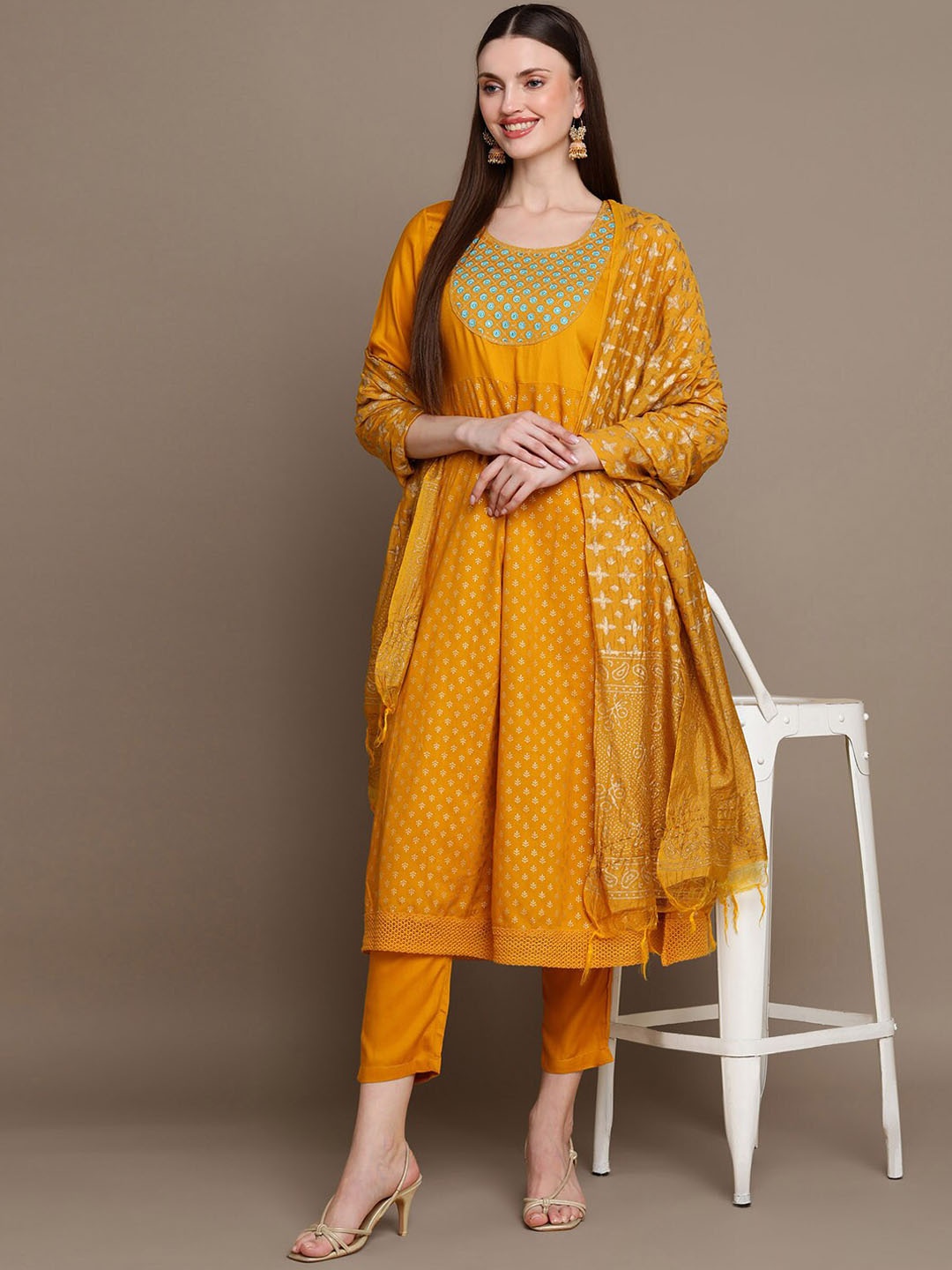 

HERE&NOW Ethnic Motifs Embroidered Mirror Work Yoke Anarkali Kurta with Trousers & Dupatta, Mustard