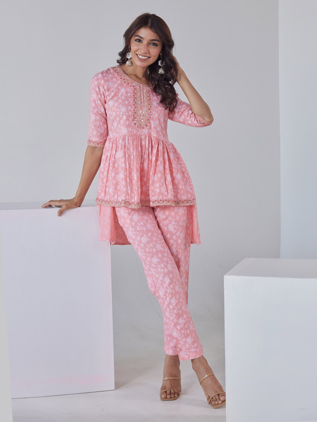 

HERE&NOW Floral Printed Embroidered Sequinned High-Low Kurti with Trouserss, Peach