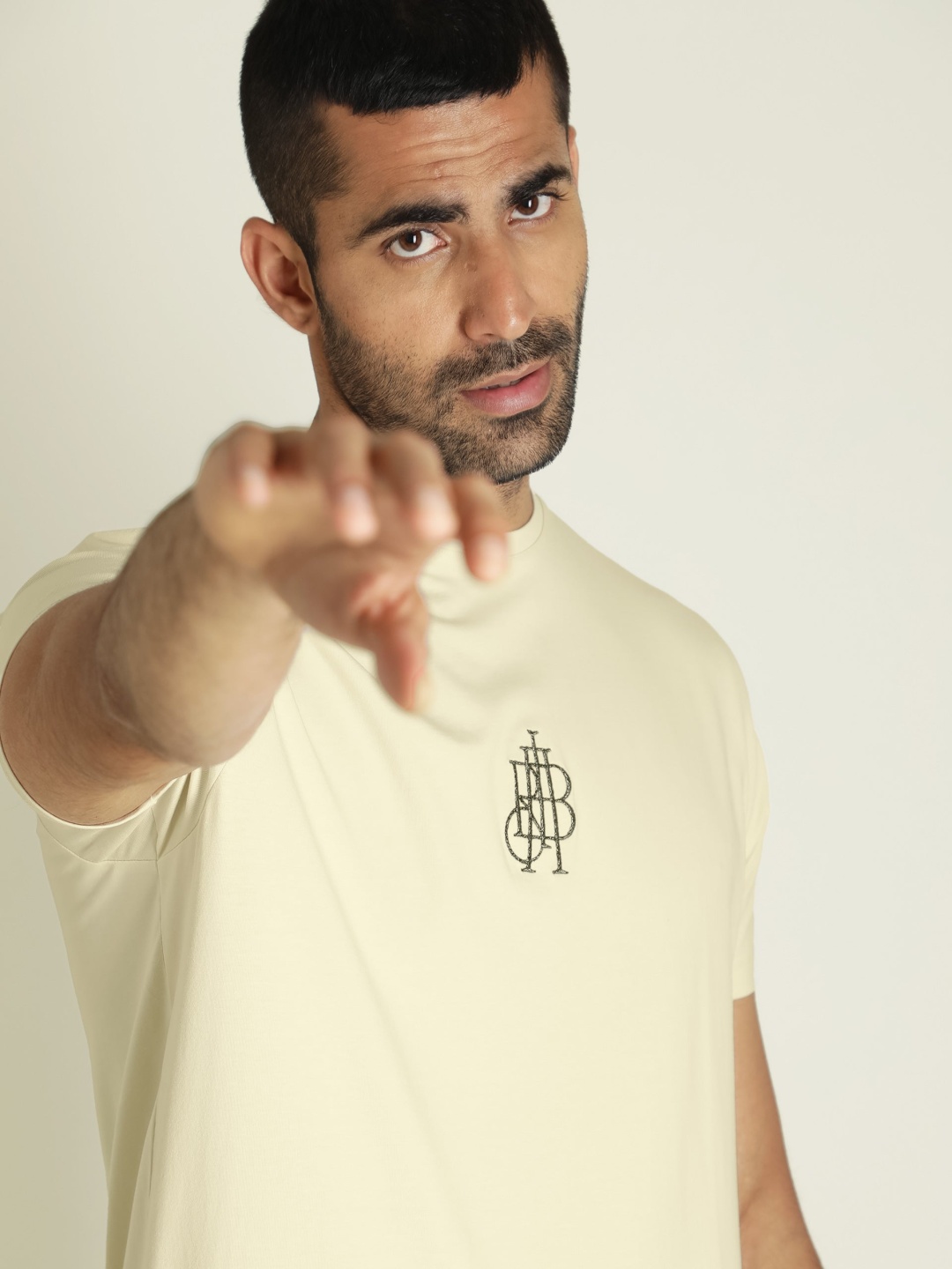 

RARE RABBIT Men Rings-4 Slim Fit Solid Polo Collar T-Shirt, Cream