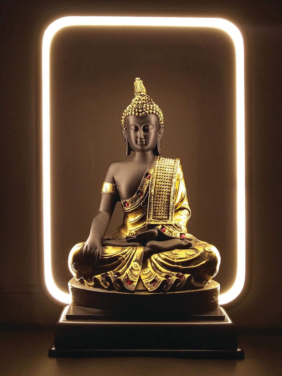 

WENS Black & Gold Toned Gautama Buddha Statue With LED Light Showpieces