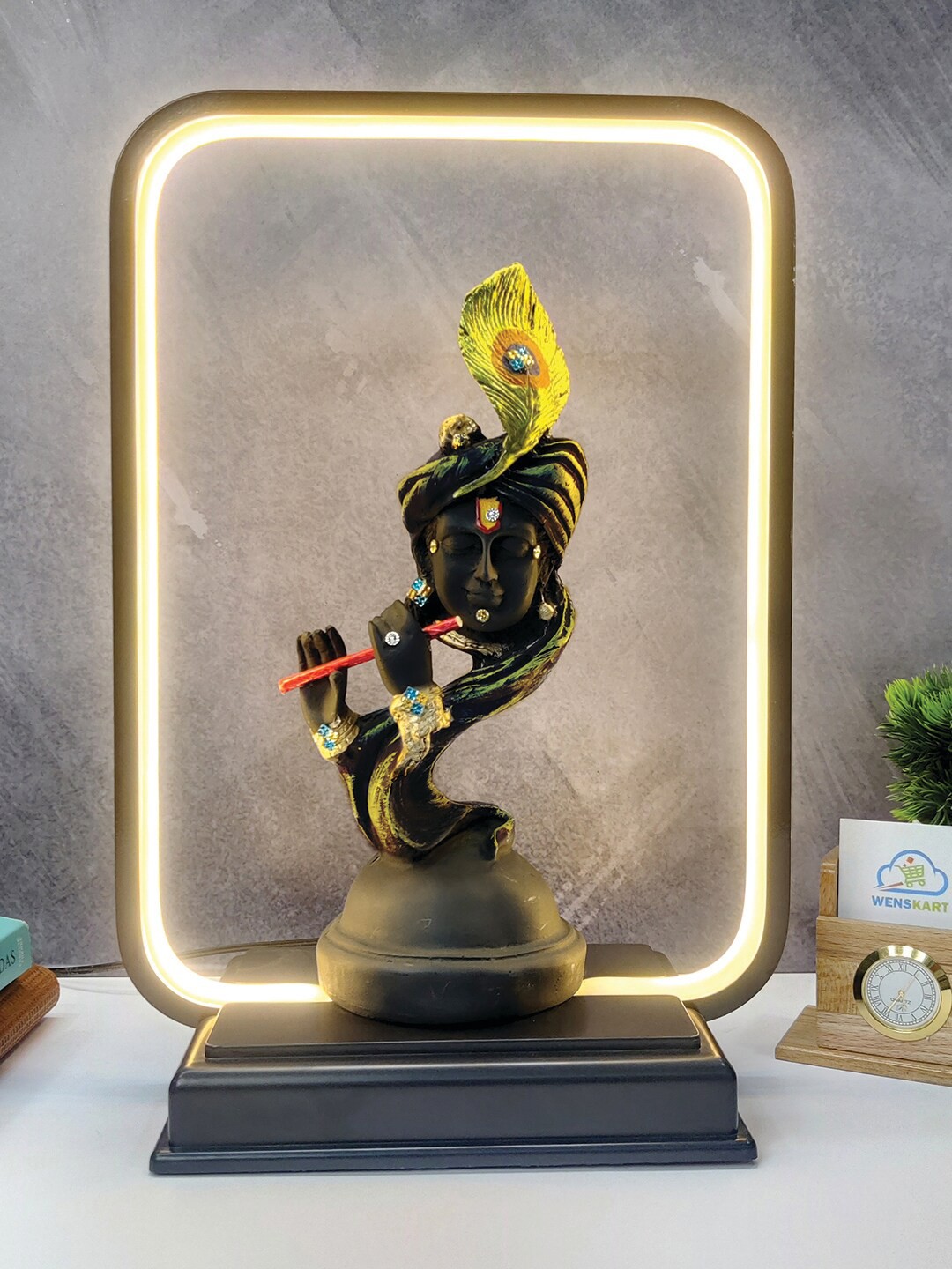 

WENS Black & Gold Toned Lord Krishna Statue With LED Light Showpiece