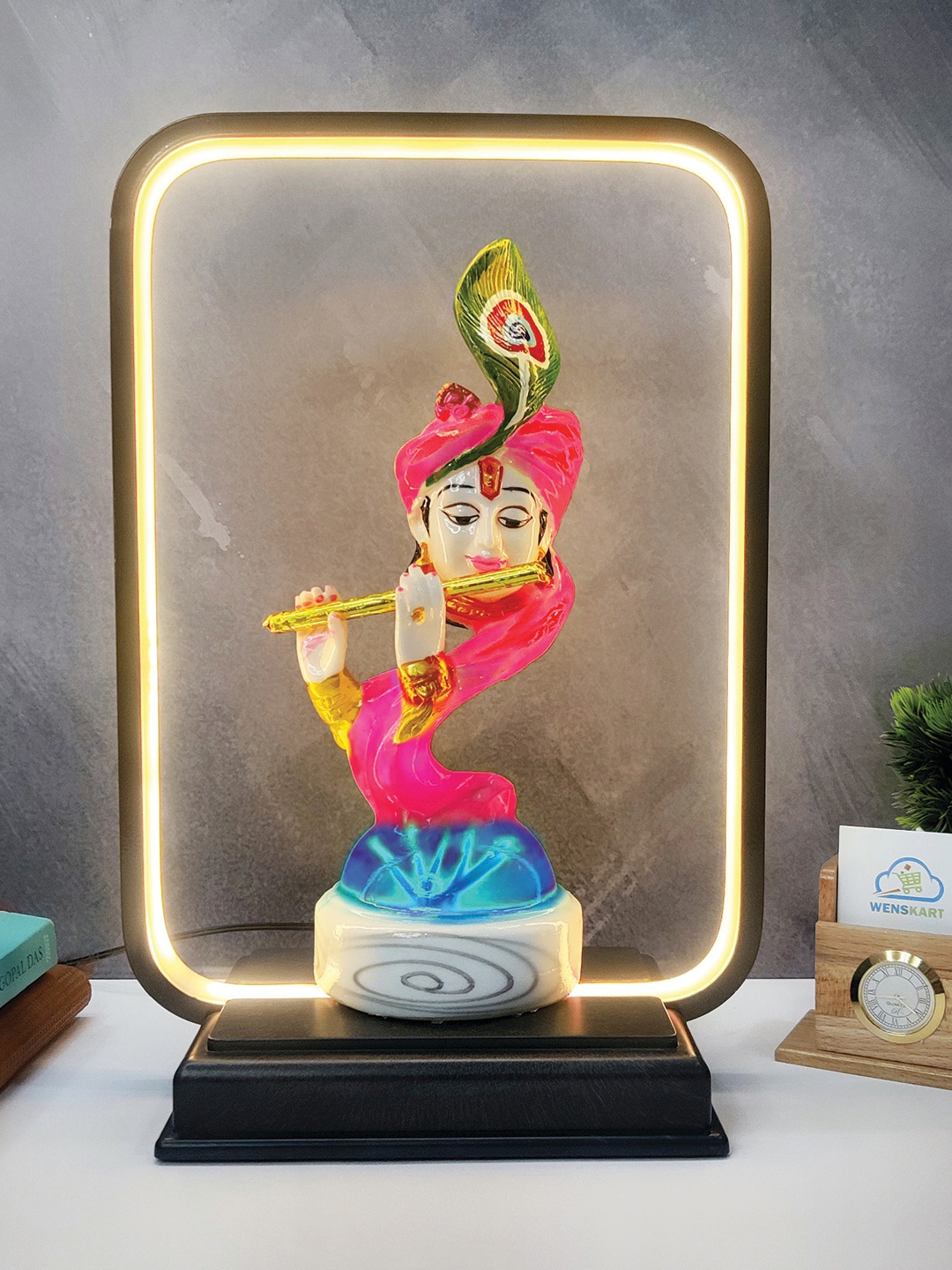 

WENS Black & Pink Lord Krishna Statue With LED Light Showpiece
