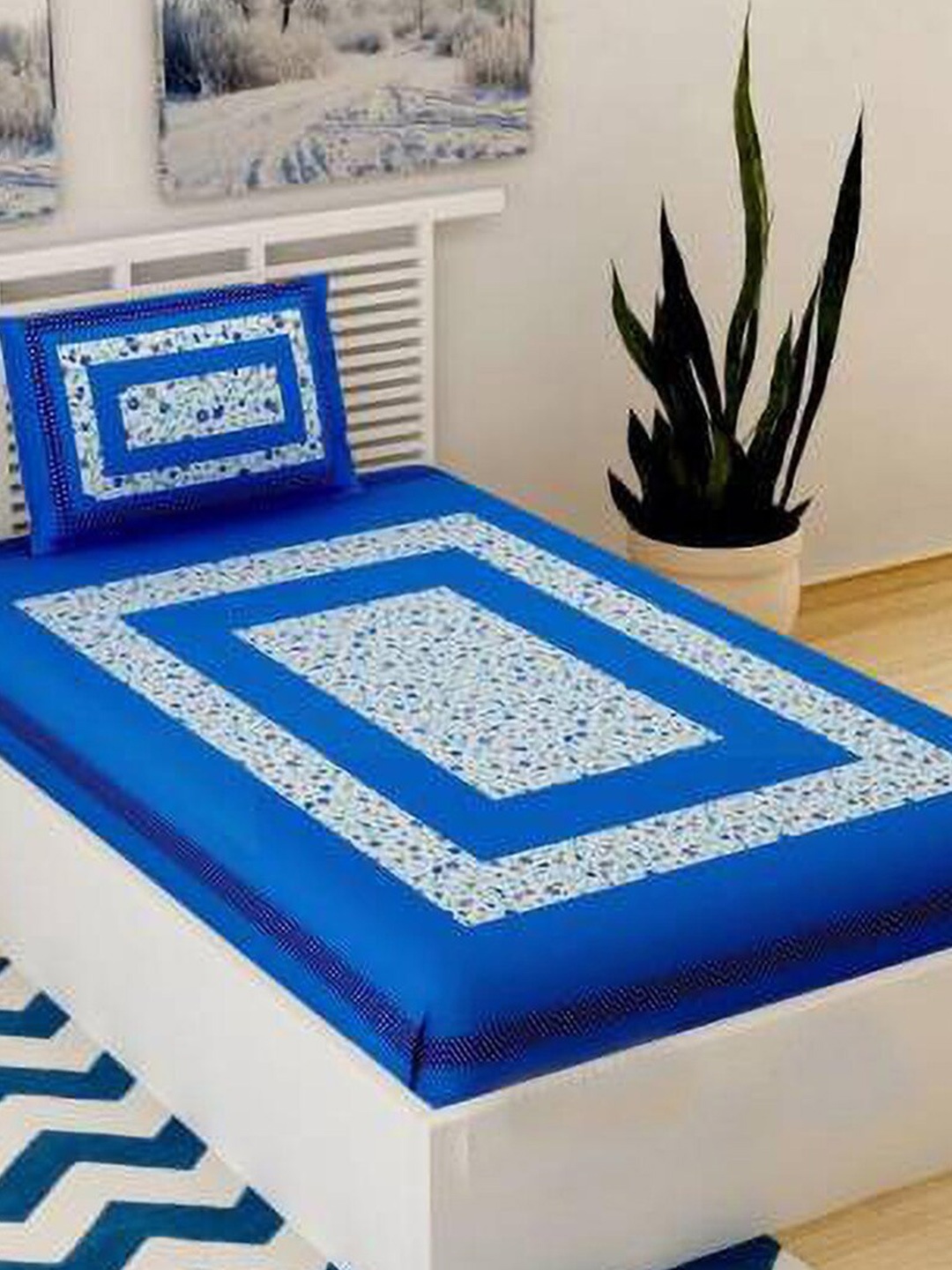 

Urban Magic Blue & White Floral Printed 104 TC Cotton Single Bedsheet & Pillow Cover