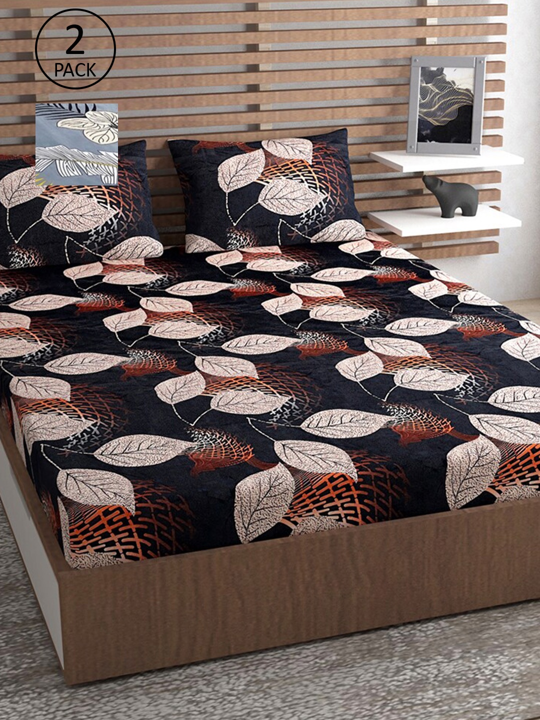 

Urban Magic Black & Grey Floral Printed 130 TC 2 Queen Bedsheets With 4 Pillow Covers