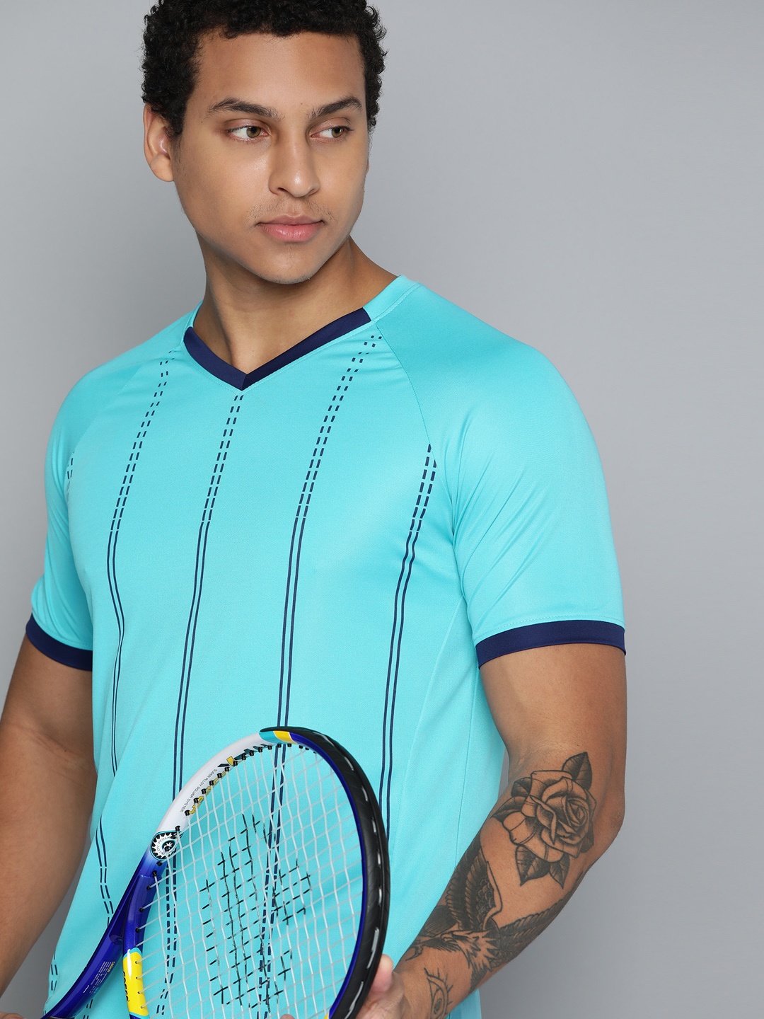 

HRX by Hrithik Roshan Rapid Dry Striped V-Neck Sports T-shirt, Blue