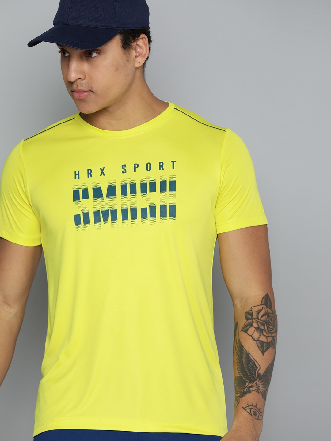 

HRX by Hrithik Roshan Men Printed V-Neck Racket Sports T-shirt, Yellow