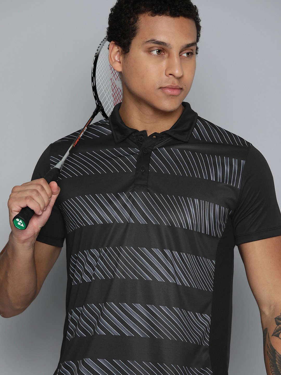 

HRX by Hrithik Roshan Rapid-Dry Striped Polo Collar Sports T-shirt, Black
