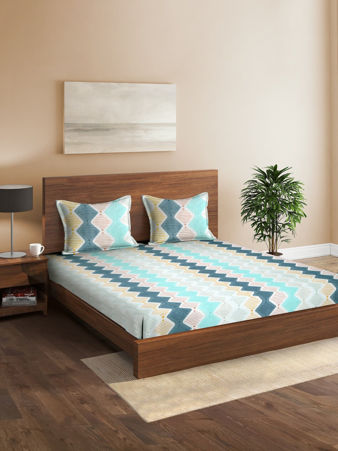 

Sangria Blue & White Geometric Printed 144 TC Double King Bedsheet & Pillow Covers