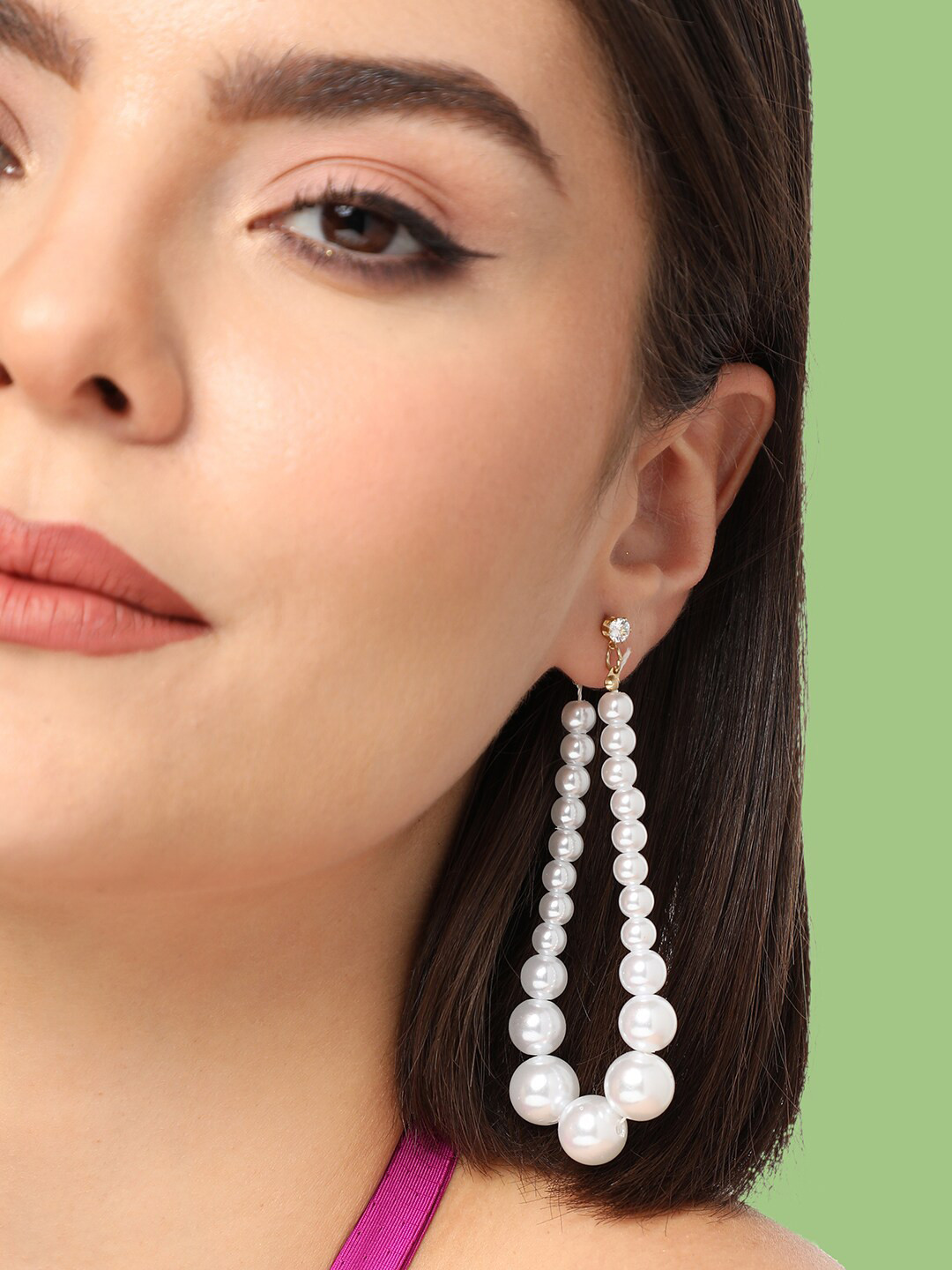 

SOHI Gold Plated Contemporary Beaded Hoop Earrings