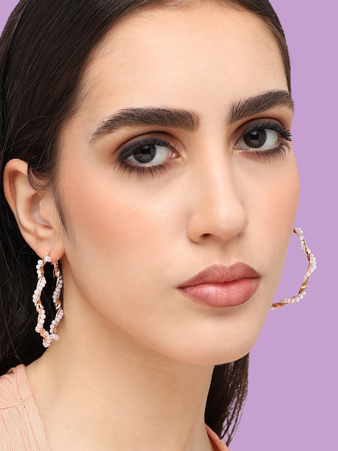 

SOHI Gold-Plated Contemporary Drop Earrings