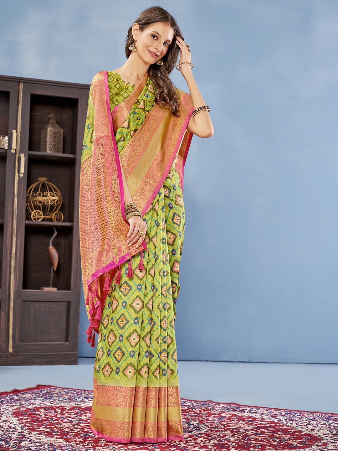 

Anouk Ethnic Motifs Printed Zari Banarasi Saree, Green