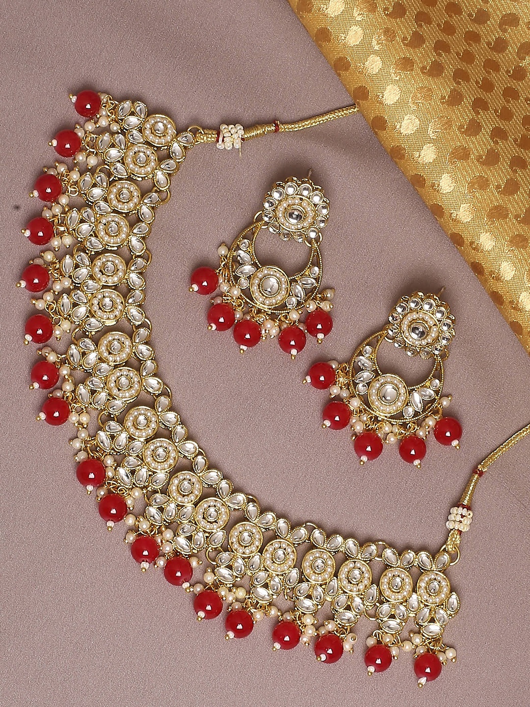 

OOMPH Gold Plated Kundan Studded & Bedaed Jewellery Set