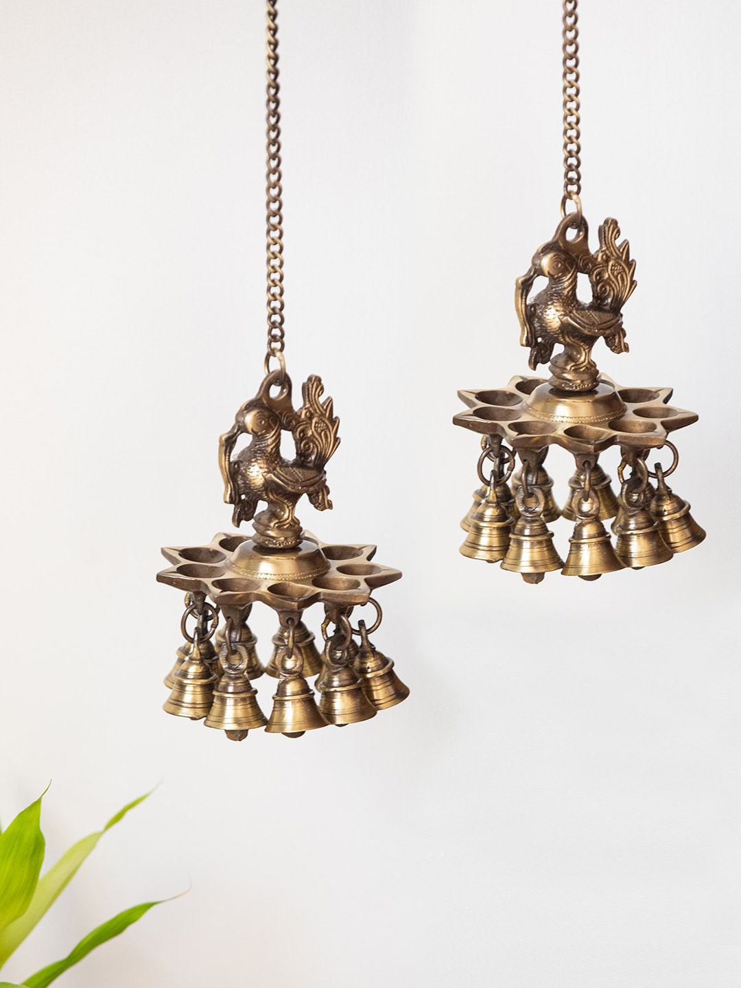 

ExclusiveLane Metallic Gold 2 Pcs Peacock Decorative Brass Hanging Diya With Bell