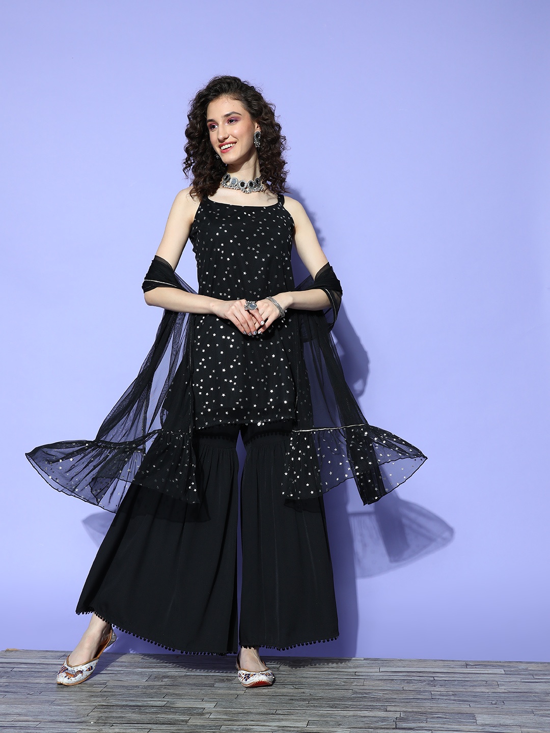

Ahalyaa Black Printed Regular Kurti With Sharara & With Dupatta