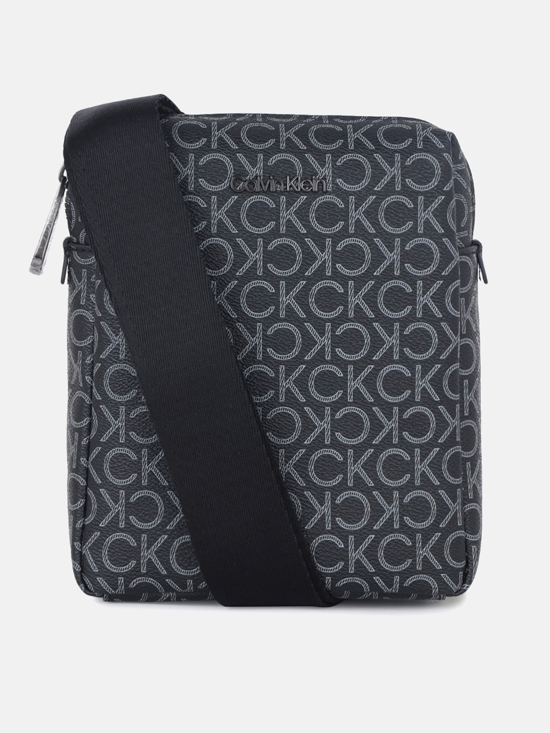 

Calvin Klein Jeans Geometric Printed Structured Sling Bag, Black