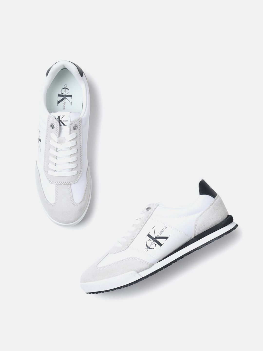 

Calvin Klein Jeans Men Colourblocked Leather Sneakers, White
