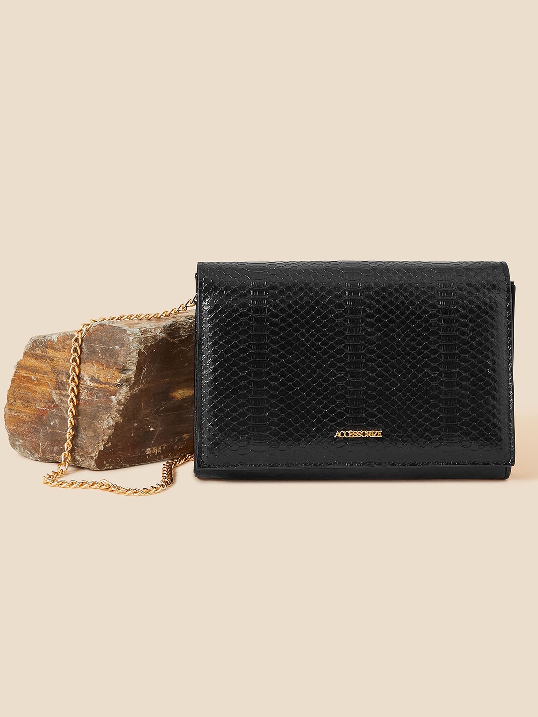 

Accessorize London Women Animal Textured Sling Bag, Black