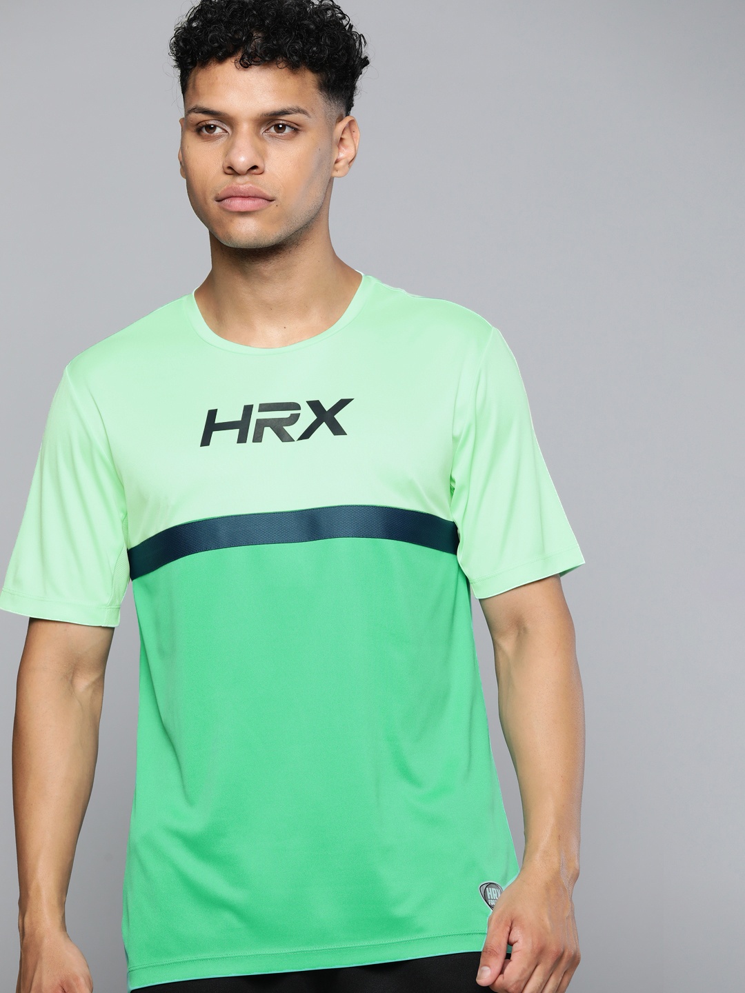 

HRX by Hrithik Roshan Men Brand Logo Colourblocked Rapid-Dry Football T-shirt, Green