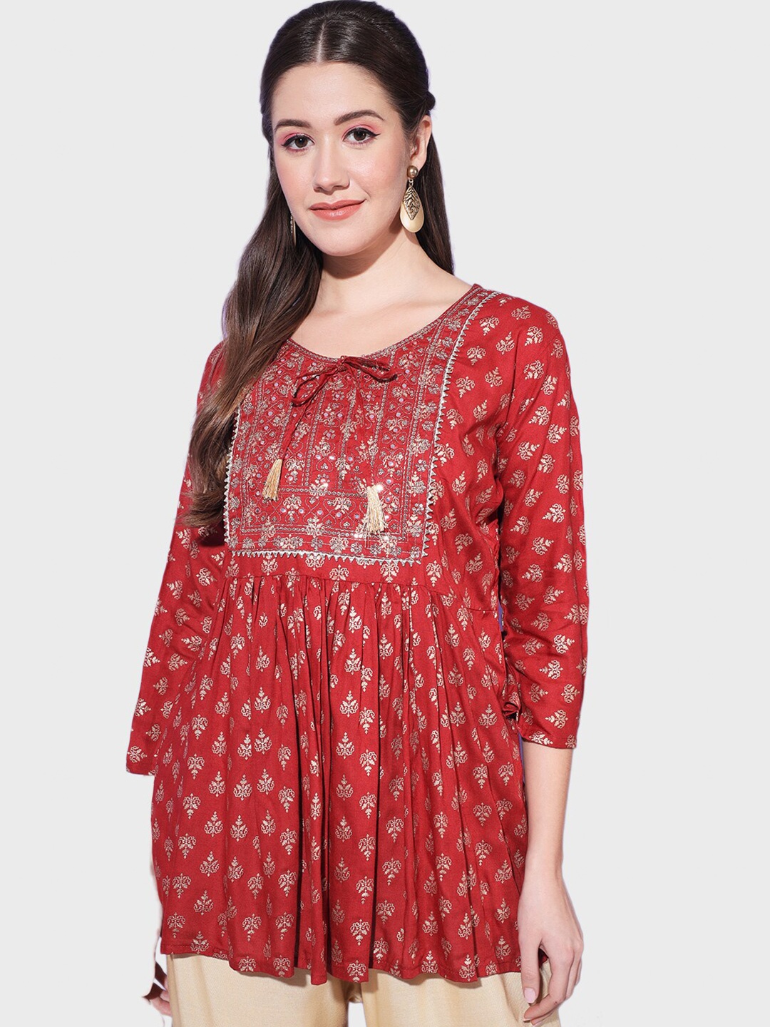 

BUY NEW TREND Ethnic Motifs Printed Sequinned Pure Cotton A-Line Kurti, Maroon