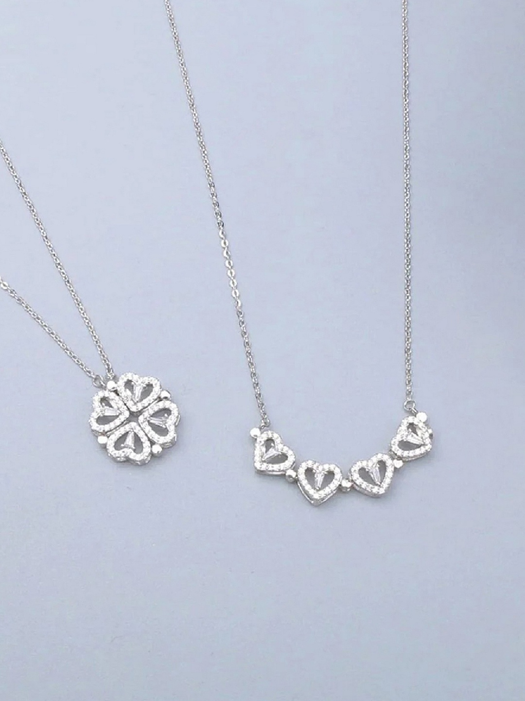 

UNIVERSITY TRENDZ Silver Plated Heart Shaped CZ Studded Pendant With Chain