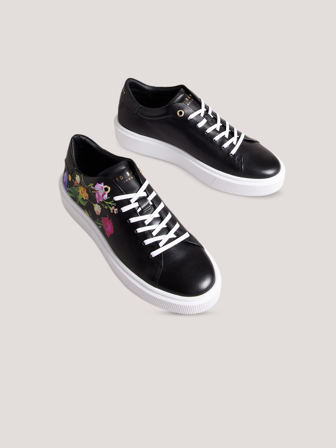 

Ted Baker Women Floral Printed Comfort Insole Contrast Sole Sneakers, Black
