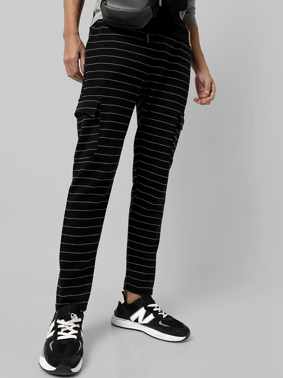 

Campus Sutra Men Striped Regular Fit Track Pants, Black
