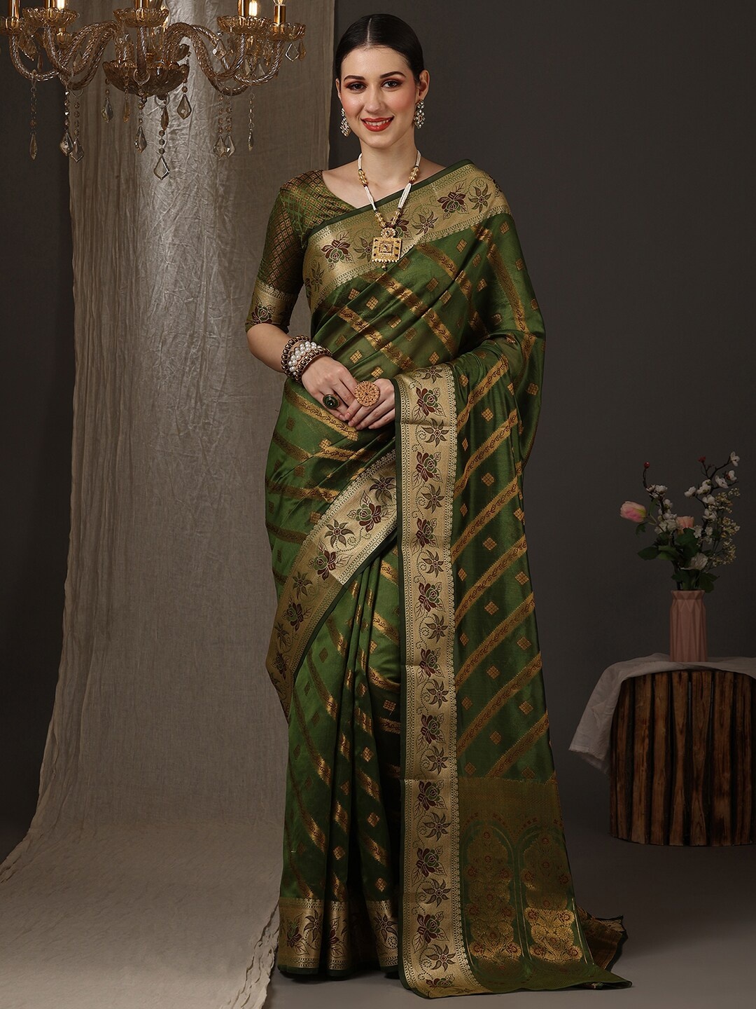 

Anouk Ethnic Motifs Woven Design Zari Organza Banarasi Saree, Green