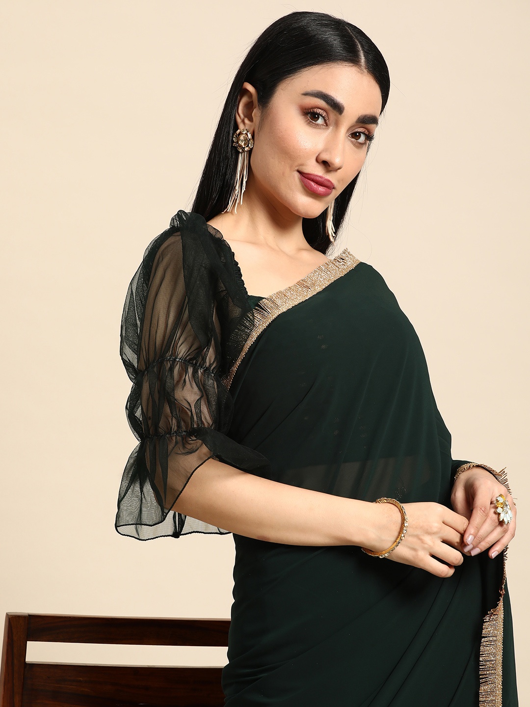 

Ethnovog Poly Georgette Saree With Stitched Blouse, Green