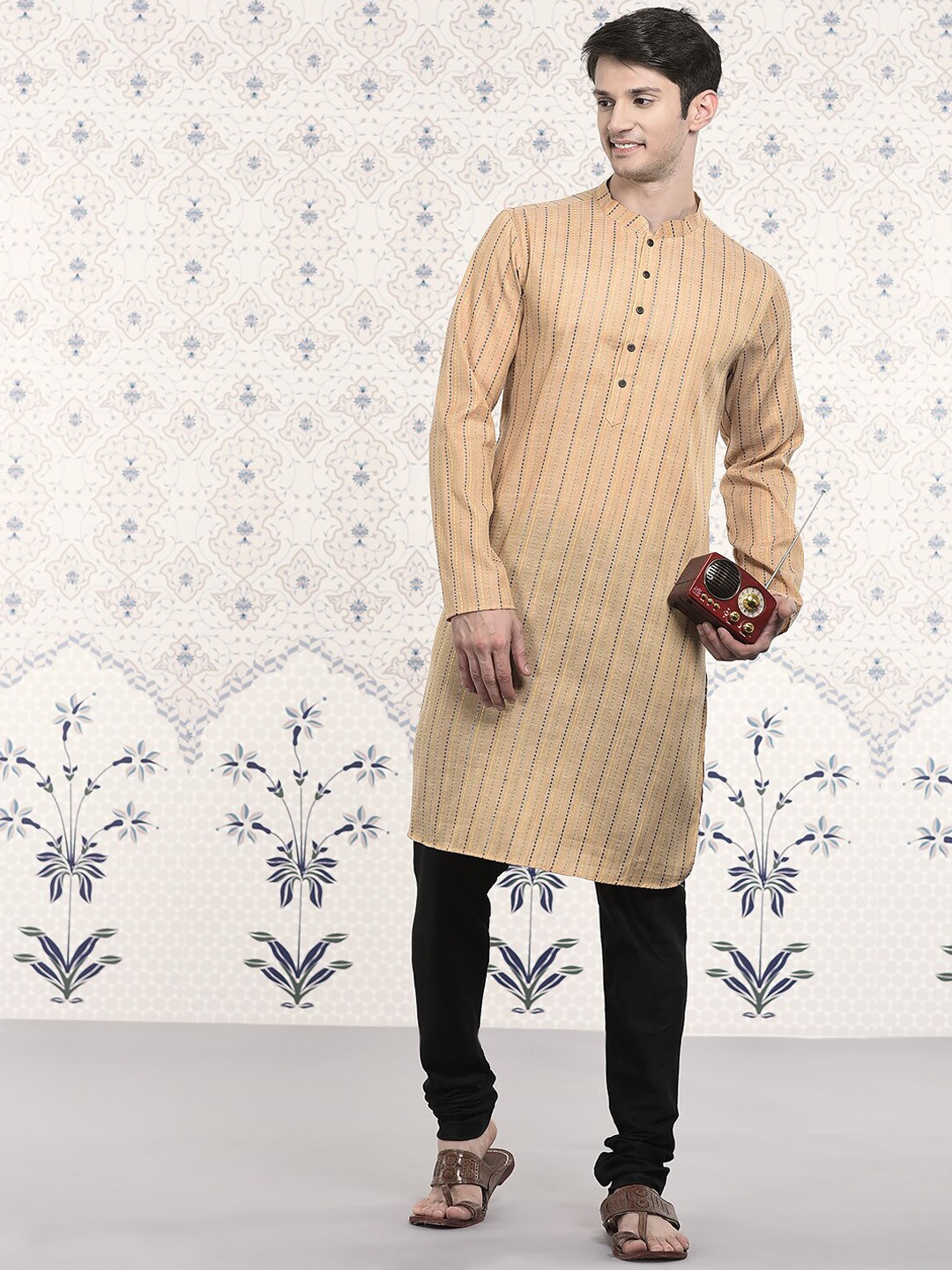 

Ode by House of Pataudi Orange Striped Mandarin Collar Kurta With Churidar