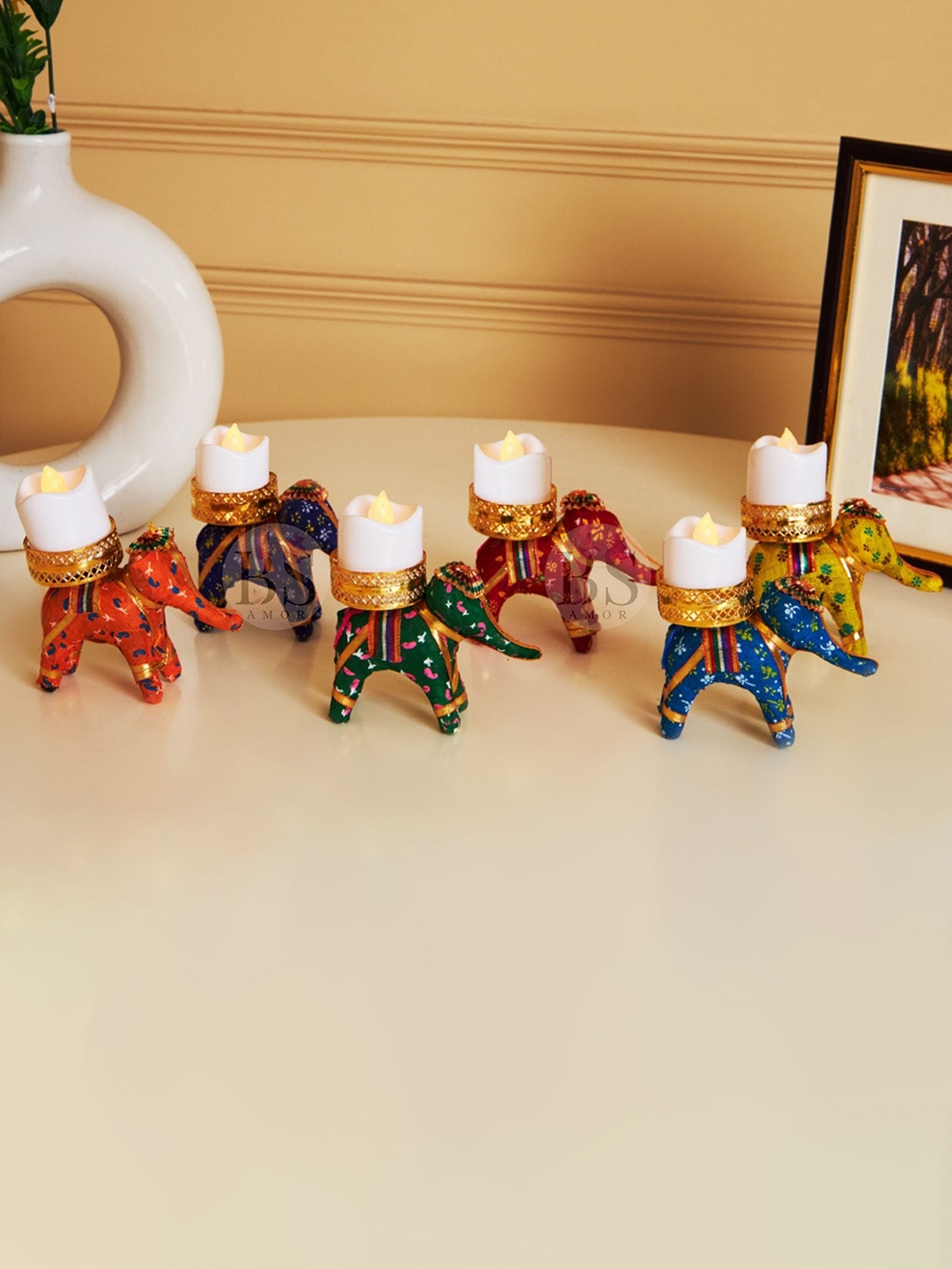 

BS AMOR White & Gold Toned 6 Pieces Elephant Tea-Light Holders