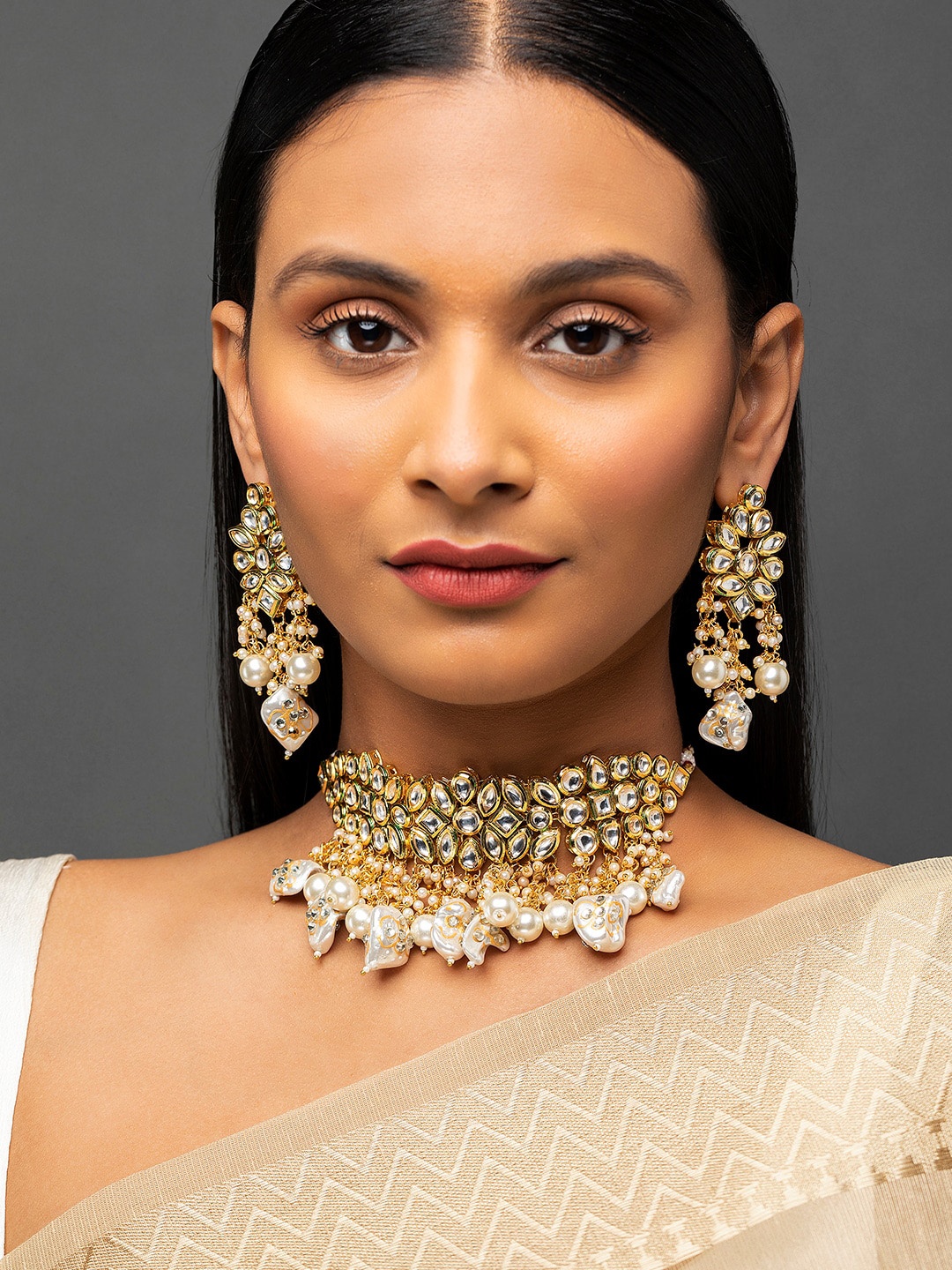 

Priyaasi Gold-Plated Floral Kundan Chunky Beads Pearl Choker Jewellery Set