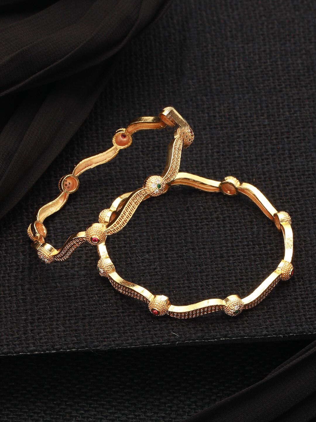 

Priyaasi Set of 2 Gold-Plated Round Leaf Design Stone Studded Bangles