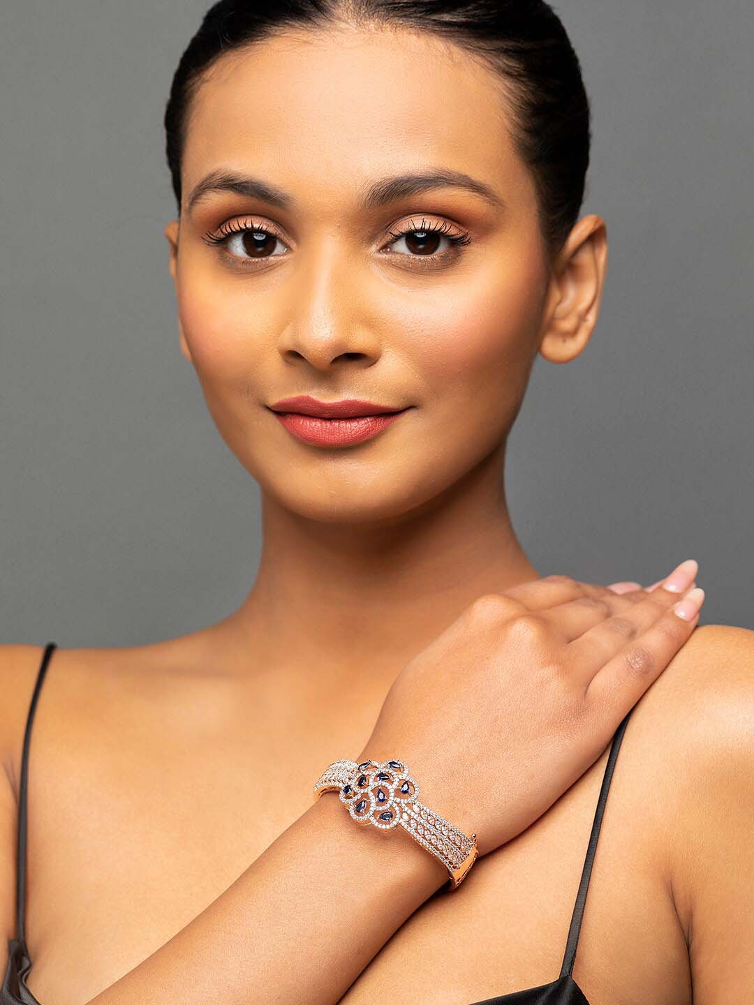 

Priyaasi Women Brass American Diamond Rose Gold-Plated Bangle-Style Bracelet