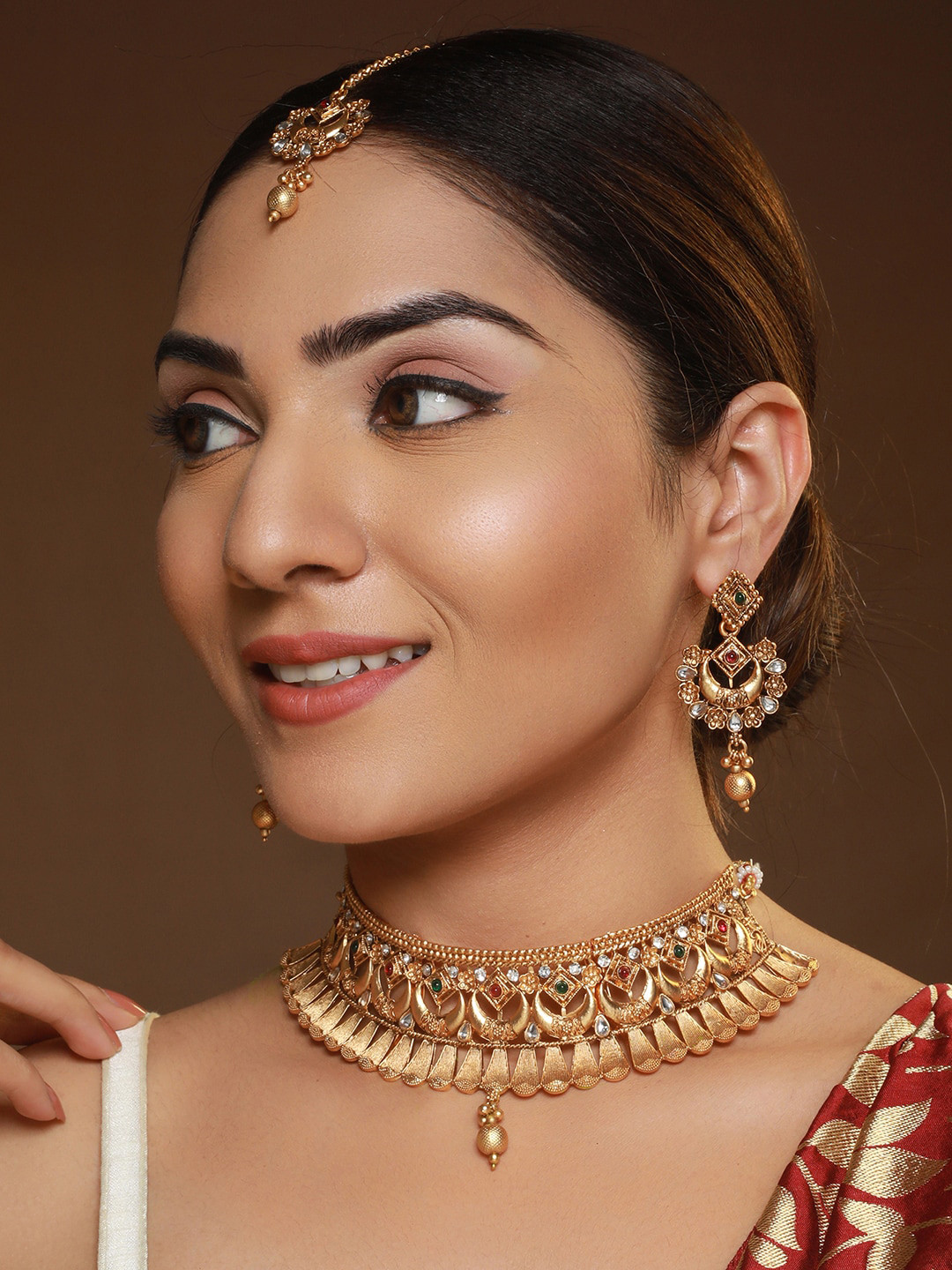 

Priyaasi Traditional Floral Stone Studded Gold-Plated Choker Jewellery Set