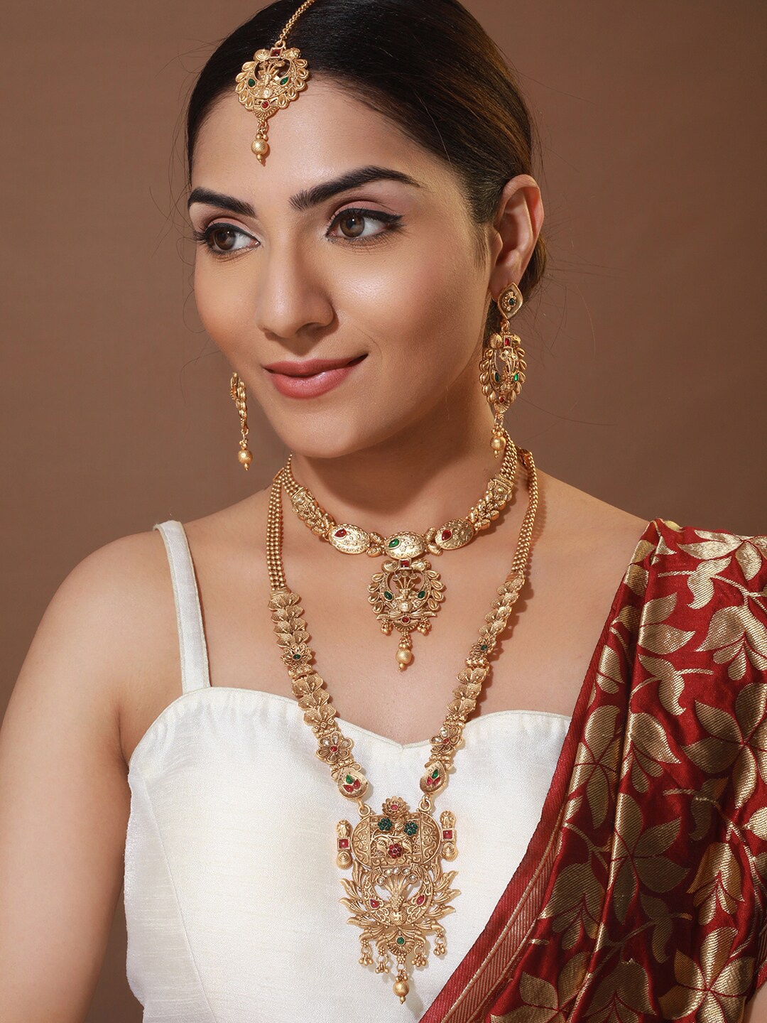 

Priyaasi Traditional Floral Studded Gold-Plated Bridal Jewellery Set with Maangtikka