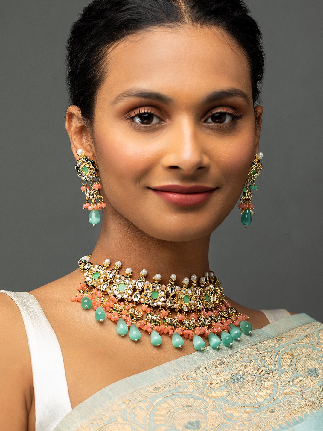 

Priyaasi Gold-Plated Floral Kundan & Pearl Studded Choker Jewellery Set, Sea green