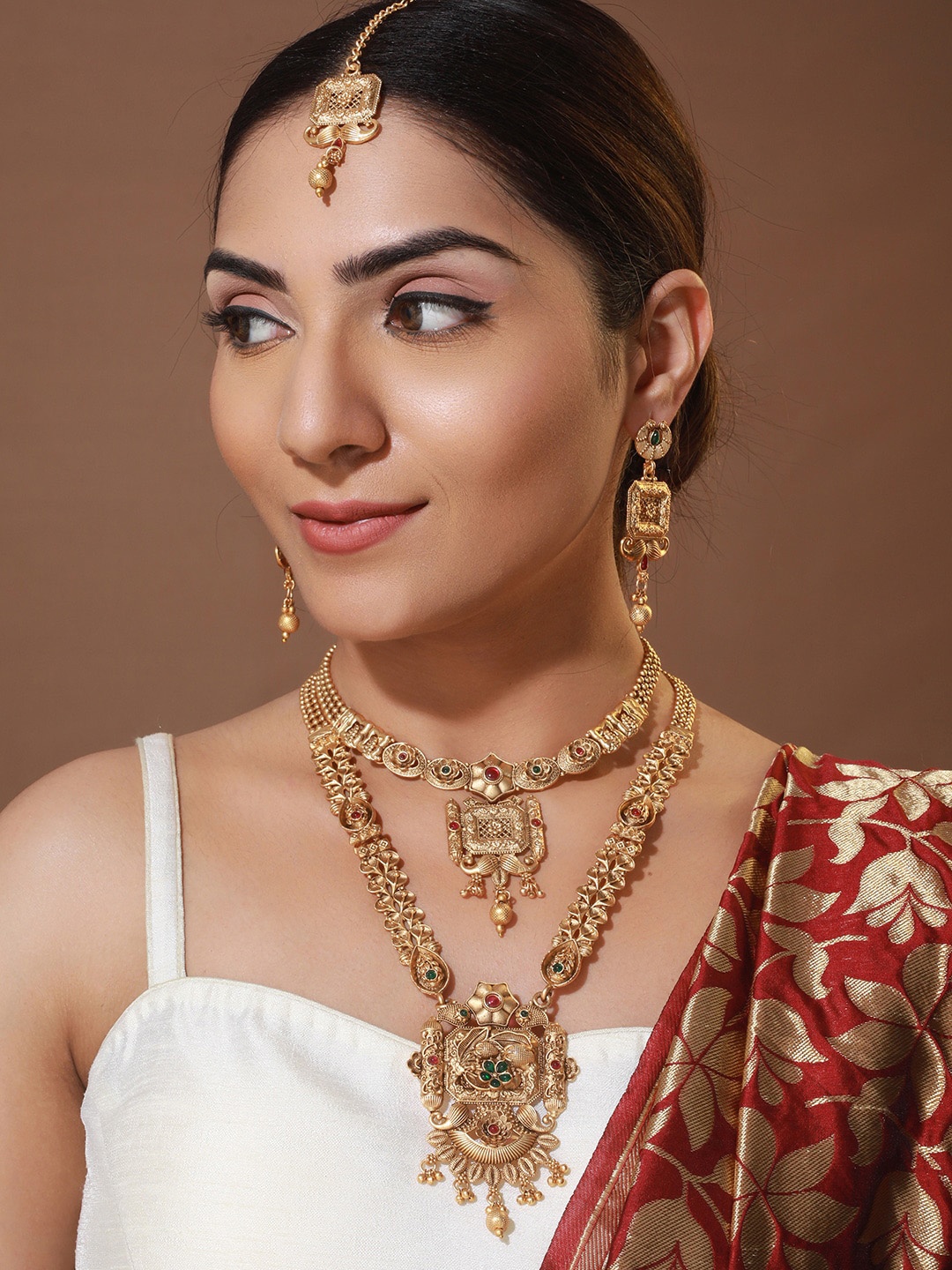 

Priyaasi Floral Block Kemp Stone Studded Bridal Jewellery Set with Maangtikka, Gold