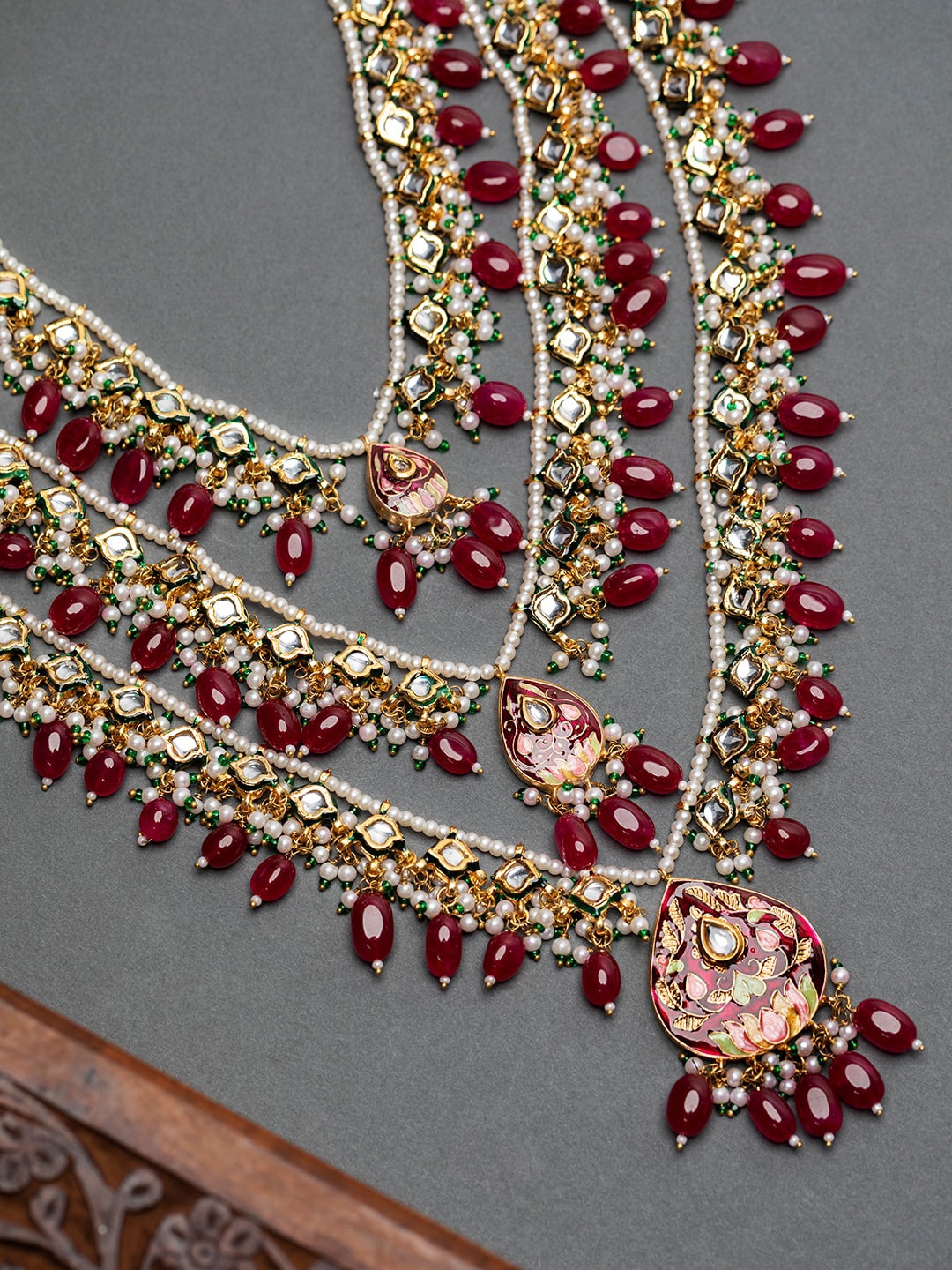 

Priyaasi Studded Buds Beaded Multilayer Gold-Plated Jewellery Set, Red