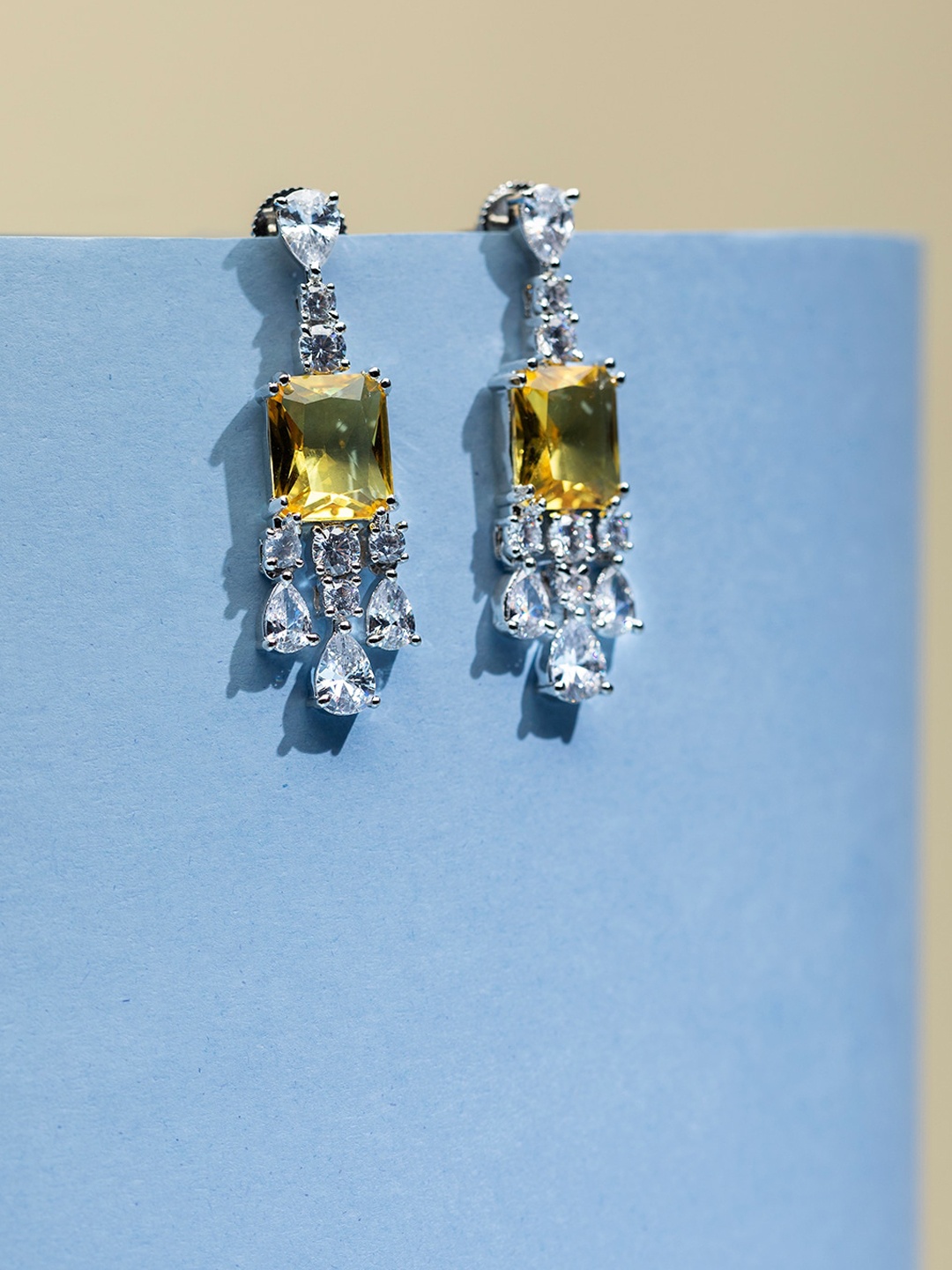 

Priyaasi Silver-Plated Contemporary American Diamond Studded Drop Earrings