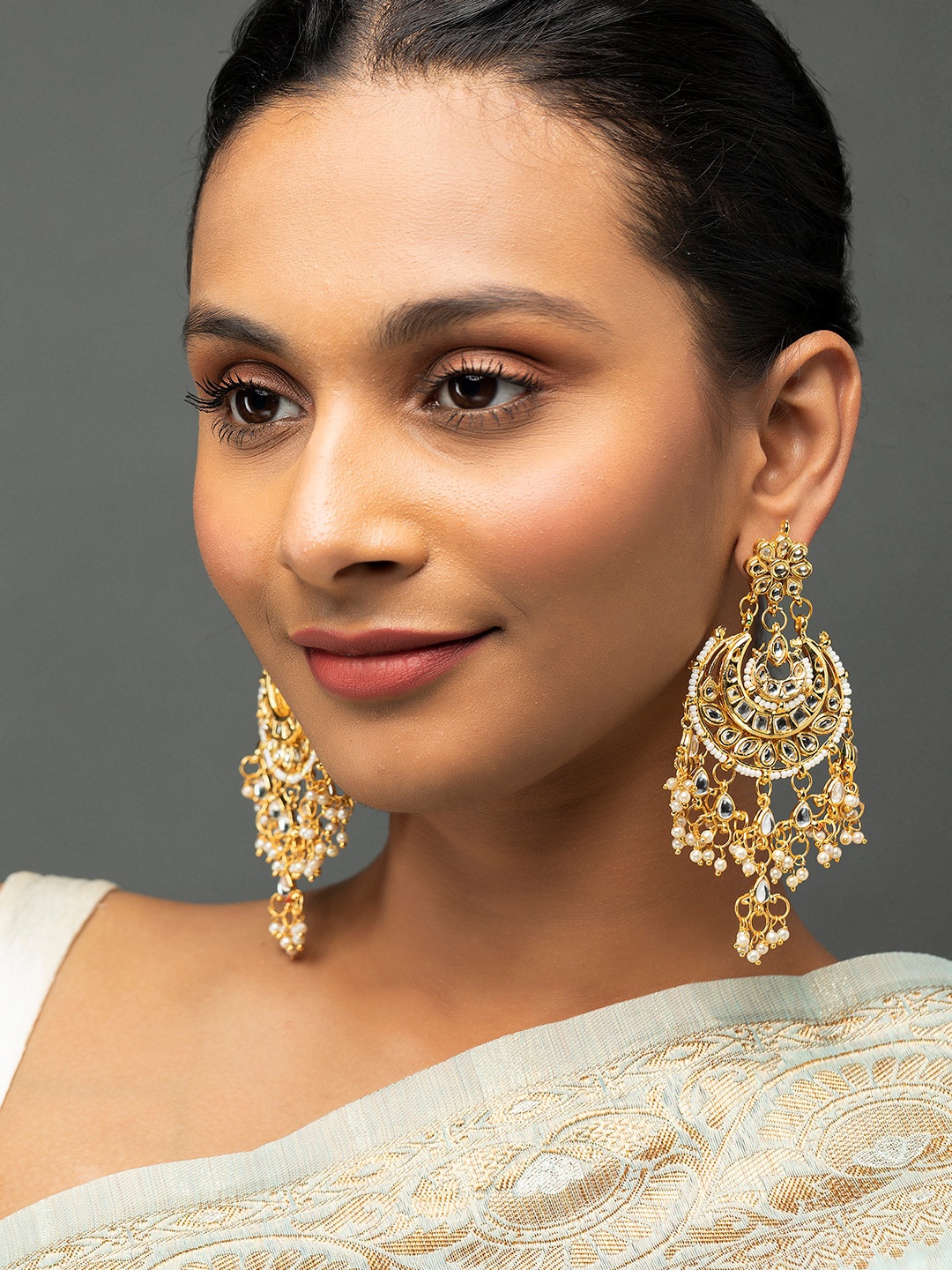 

Priyaasi Gold-Plated Contemporary Kundan Studded Chandbalis Earrings
