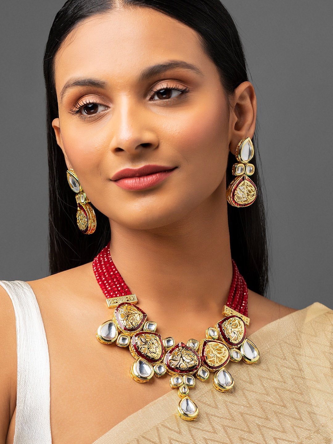 

Priyaasi Gold-Plated Kundan Studded Layered Jewellery Set, Red