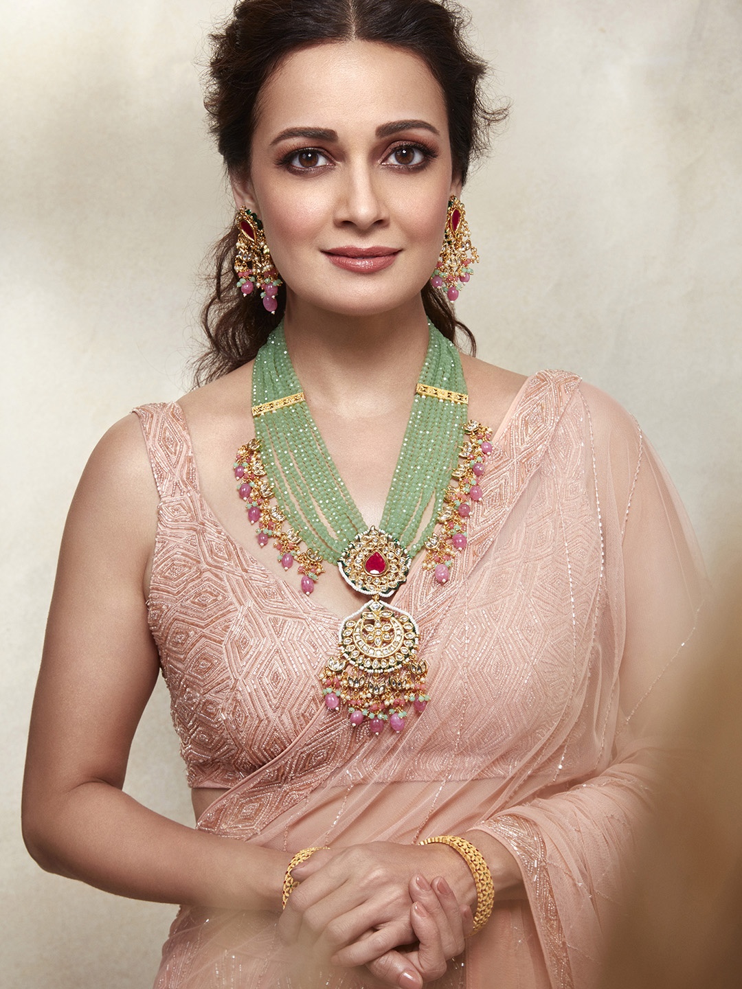 

Priyaasi Gold-Plated Floral Leaf Kundan Multilayer Beaded Jewellery Set