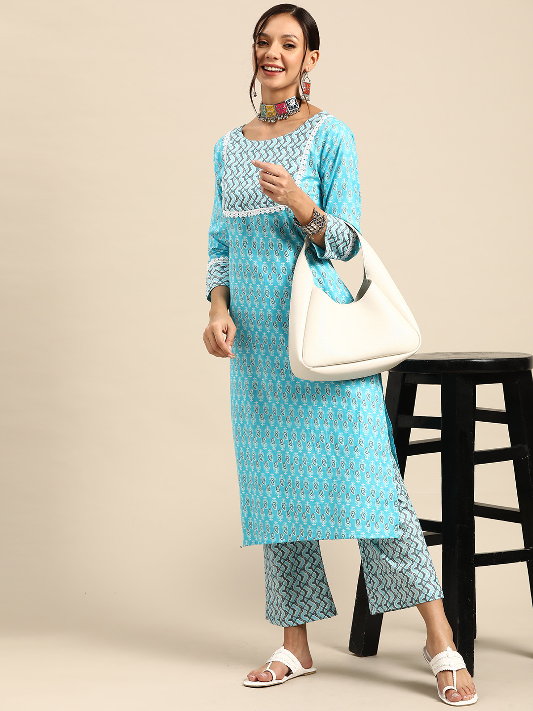 

Sangria Ethnic Motifs Printed Regular Pure Cotton Kurta with Palazzos, Turquoise blue