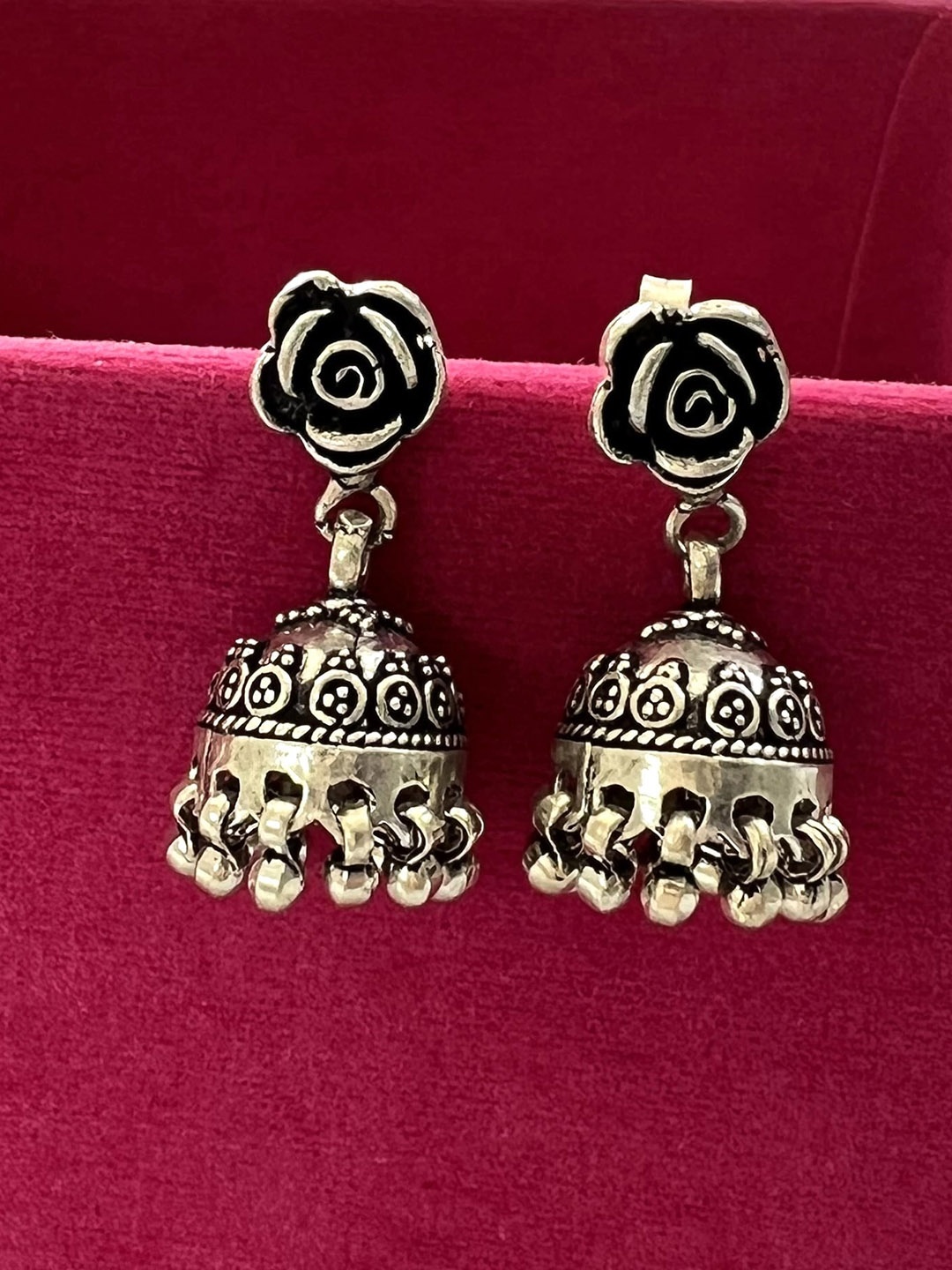 

Arte Jewels Silver-Plated Oxidized Dome Shaped Jhumkas