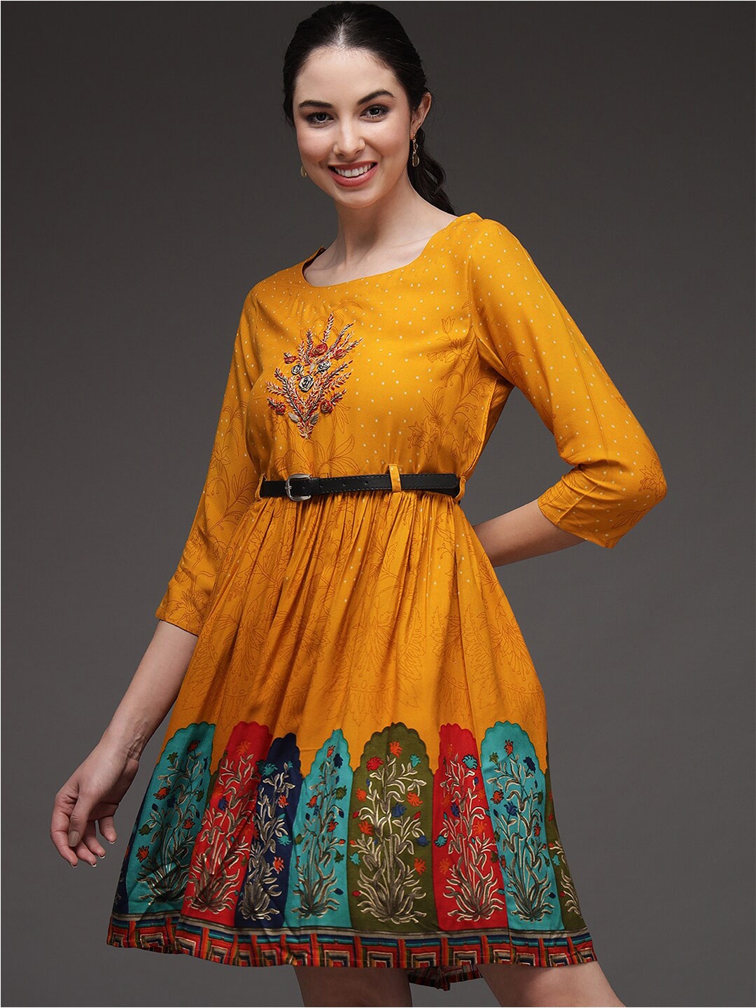 

Spera Round Neck Ethnic Motifs Printed Fit & Flare Ethnic Dress With Belt, Mustard