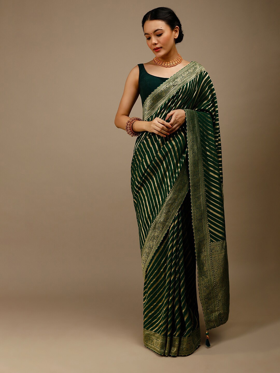 

KALKI Fashion Striped Zari Pure Georgette Saree, Green