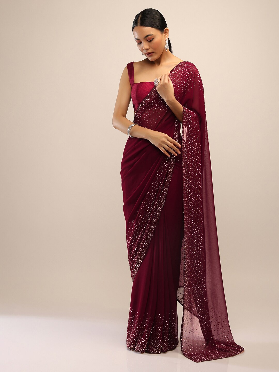 

KALKI Fashion Beads and Stones Embelished Pure Georgette Saree, Maroon